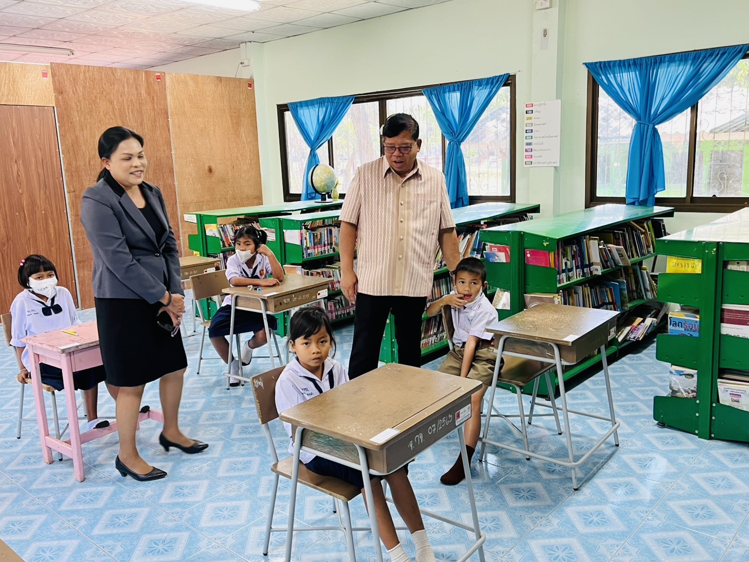 ตรวจเยี่ยมให้กำลังใจ ผู้บริหาร ครูนักเรียน ในการดำเนินการประเมินความสามารถด้านการอ่านของผู้เรียน (Reading Test:RT) ชั้นประถมศึกษาปีที่ 1